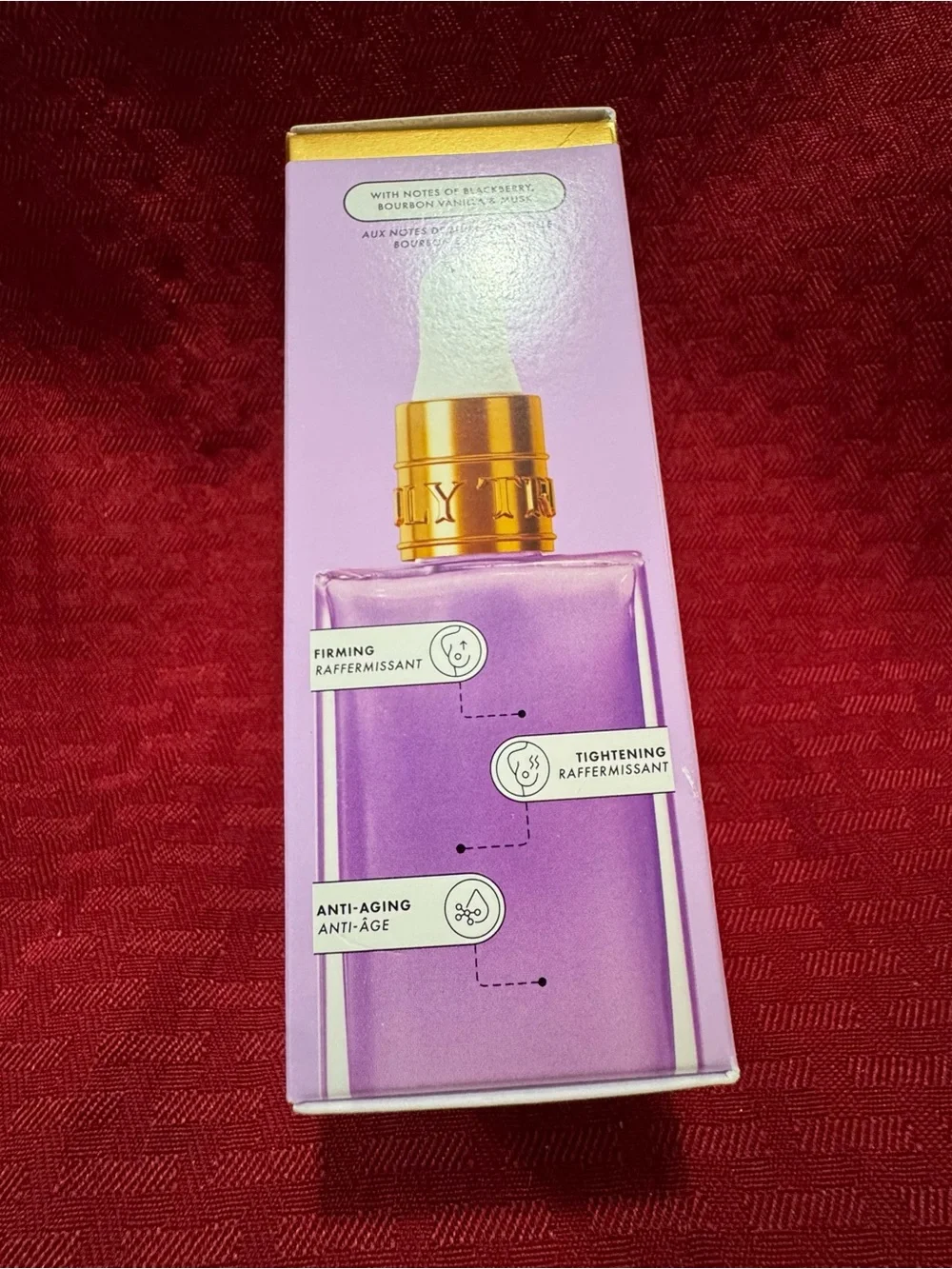 TRULY Firming Body Serum in Purple and Gold Accents